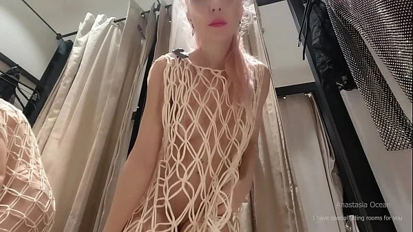 I try on clothes in fitting room with open curtain. Hotwife