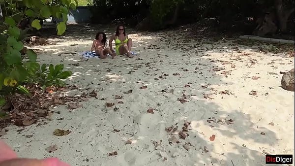 Voyeur pervert jerks off busty MILF and her stepdaughter and cums on their faces while they sunbathe