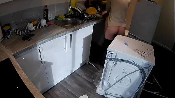 Horny wife seduces a plumber in the kitchen while her husband at work.