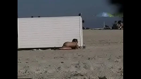 Exhibitionist Wife 19 - Anjelica teasing random voyeurs at a public beach by flashing her shaved cunt!