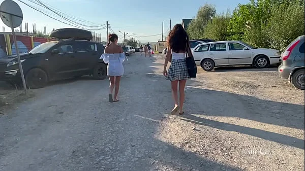 Two girls walk in public without panties and show pussies